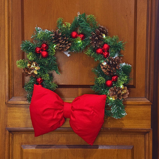 Ghirlanda rossa con luci e fiocco